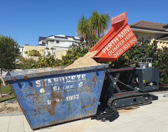 Our 750mm wide mini dumper can lift sand 1.3m high and tip.